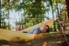 The participant of the Green Academy 2020 lies in a hammock
