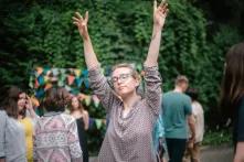 A member of the Green Academy is dancing