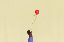 Ілюстрація з дівчинкою, яка відпускає у небо кульку, на якій написана температура потепління у світі