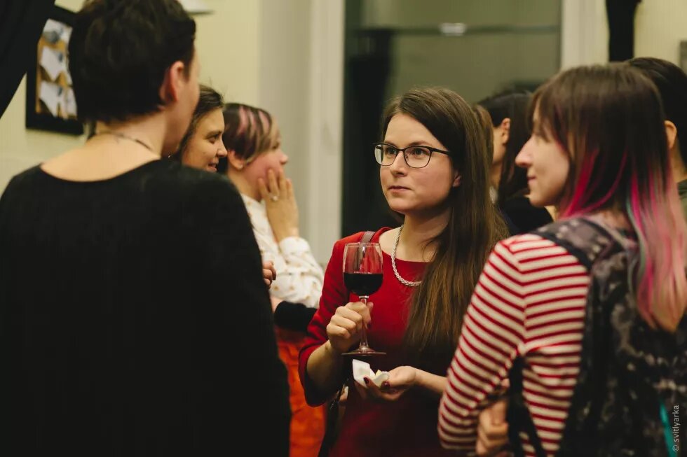 Participants of exhibition opening at the reception