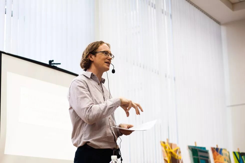 Photo of Uilleam Blacker during his public lecture in Kyiv