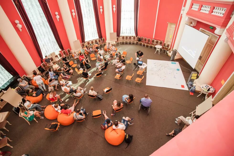 Forum participants sitting in a circle